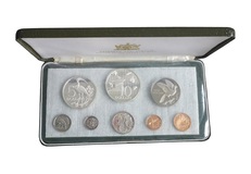1974 Trinidad and Tobago Eight-Coin Proof Set. Note the Green material fixed to the plastic base is in bad condition, otherwise coins FDC