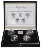 Pre-Owned 1984 - 1987 United Kingdom  (4-coin) £1 Silver Proof " PIEDFORT" Collection, Boxed with Royal Mint Certificate FDC